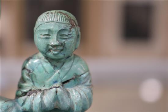 A Chinese turquoise matrix group of a buddha and attendants, circa 1900, 6.75in. 9in. overall